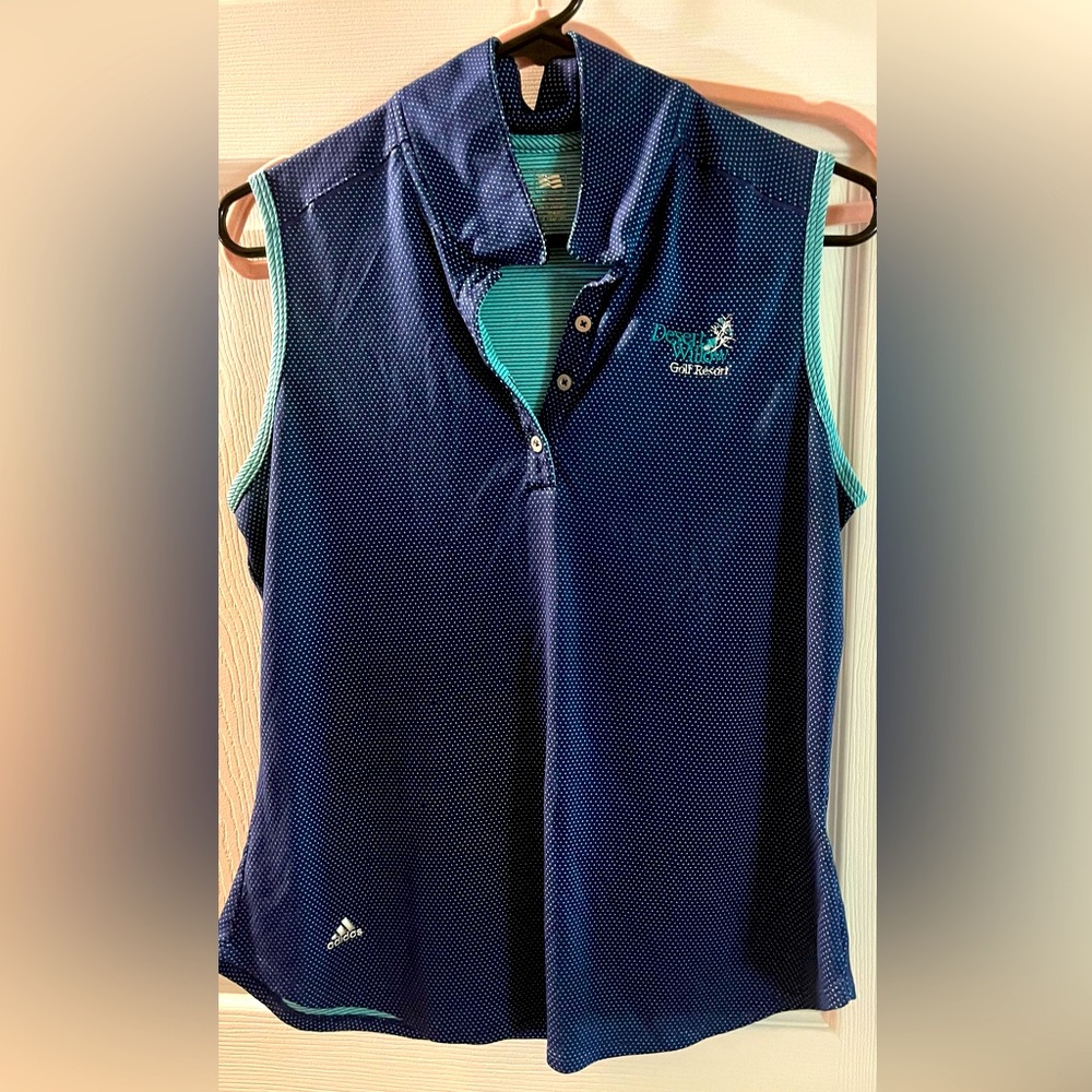 Adidas sleeveless golf shirt.